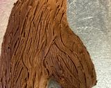 A picture of step 9 of Biscoff Christmas yule log.