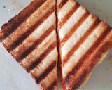 A picture of step 5 of Tomato and Cheese Grilled Sandwich.