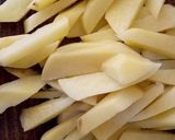 Foto del paso 2 de la receta: Chupeticas de pollo con especias y papas al estilo tailandés
