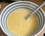 A picture of step 1 of Steamed Egg in the Microwave.