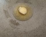 A picture of step 4 of Sukhe nariyal ki chikki.