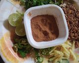 A picture of step 7 of Beef haleem with boil rice.