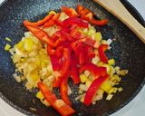 Foto del paso 5 de la receta Rollito de ternera relleno de jamón y queso en salsa de pimentón
