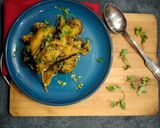A picture of step 8 of Aloo Baingan.