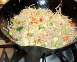 A picture of step 4 of Stir-Fried Shrimp with Brown Rice, Broccoli, and Edamame.