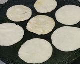 A picture of step 4 of Maida chapati with kurma.