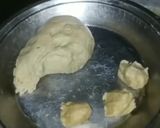 A picture of step 9 of Ashtami special prasaad the puri chana and halwa thali.