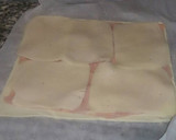Foto del paso 2 de la receta: Rulitos de jamón y queso