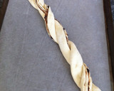 Foto del paso 6 de la receta: Trenza de hojaldre con nutella y chispas de chocolate