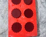 A picture of step 4 of Black currant ice discs.