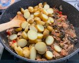 Une image de l'étape 17 de Effiloché de porc aux pommes de terre, champignons et coriandre.