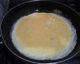 Foto del paso 2 de la receta: Omelette de arroz con queso y jamón
