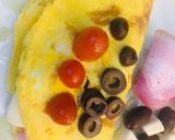 Foto del paso 5 de la receta: OMELET🌮(relleno de panceta ahumada, queso y aceitunas)🌮Y en homenaje al DÍA INTERNACIONAL DEL HUEVO🥚
