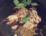 A picture of step 2 of Spicy fried potato sabzi.
