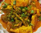 A picture of step 10 of Green Peas and Paneer Curry.