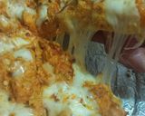 A picture of step 5 of Chéésy cheese 🧀 chicken 🐔 pizza 🍕🍕.