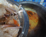 A picture of step 5 of Colourful Stringhoppers with Crab stew.
