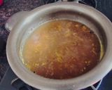 A picture of step 2 of Raw turmeric and Ginger kaadha.