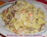 Foto del paso 7 de la receta: Fetuccini con carne y marisco