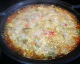 Foto del paso 7 de la receta: Arroz Nomen con alas de pollo, bimi y alcachofas