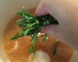A picture of step 5 of Miso soup with kale.
