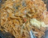 A picture of step 6 of Chicken fettuccine creamy pink pasta.