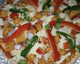 A picture of step 4 of Smoked chicken tikka flavour pizza 🍕🍕🍕🍕😋😋😋😋.