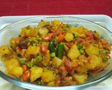 A picture of step 2 of Prawns with Potato and Green Peas.