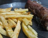 Foto del paso 5 de la receta: Costillas de cerdo con papas fritas
