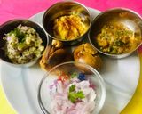 A picture of step 7 of Exotic Sattu Bati with lavish Tamatar and Aloo Chokha And Masala Dal.