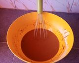 A picture of step 2 of Moist chocolate cake using table top cooker.