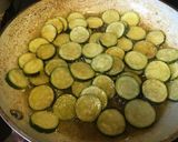 A picture of step 1 of Sautéed zucchini (garnished with shiso leaves).