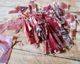 Foto del passaggio 6 della ricetta ROSETTE AL NERO DI SEPPIA CON ZUCCA ALLO  SPECK E MANDORLE