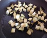 Foto del passaggio 4 della ricetta Tortiglioni con gamberi, crema di melanzane e datterini