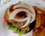 A picture of step 6 of My Chilli Burger with lots of toppings 😘.
