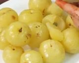 A picture of step 2 of Khati mithi amla candy.