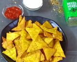 A picture of step 4 of Nachos with cheesy dip.