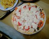 صورة لخطوة 4 من وصفة احلي بيتزا 🍕 ده ولا ايه يارب تعجبكم
