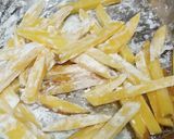 A picture of step 3 of Chessy pizza fries.