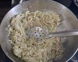 A picture of step 2 of Bottle gourd halwa with nuts and saffron.
