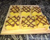 Foto del paso 6 de la receta: Cuadraditos de Naranja decorados con chocolate