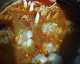 A picture of step 5 of Colourful Stringhoppers with Crab stew.