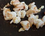 A picture of step 4 of Sautéed Pea Shoots with Shrimp.