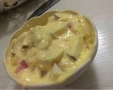 A picture of step 4 of Creamy mango fruit salad.
