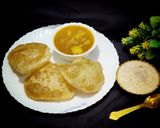 A picture of step 5 of Poori- aloo curry and kheer.