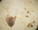 A picture of step 1 of Naan Bread.