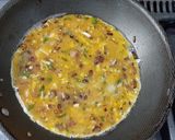 Foto del paso 3 de la receta: Omellette de panceta, queso y hierbas aromáticas