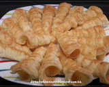 Foto del paso 5 de la receta: Conos de hojaldre rellenos de crema pastelera