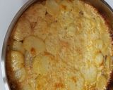 A picture of step 4 of Meat with potatoes in the oven.