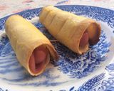 Foto del paso 4 de la receta Rollitos de salchicha y pavo al huevo🍞
